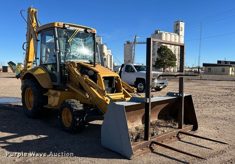 image for item DQ3160 1997 New Holland 575E backhoe