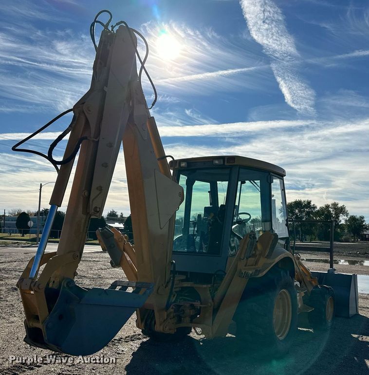 image for item DQ3160 1997 New Holland 575E backhoe