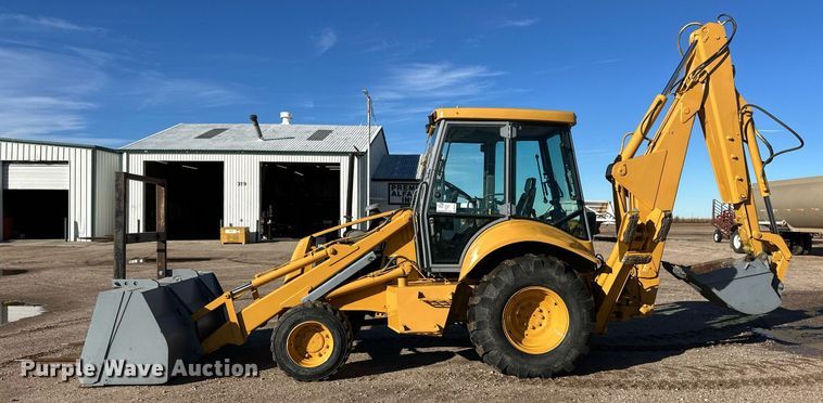 image for item DQ3160 1997 New Holland 575E backhoe