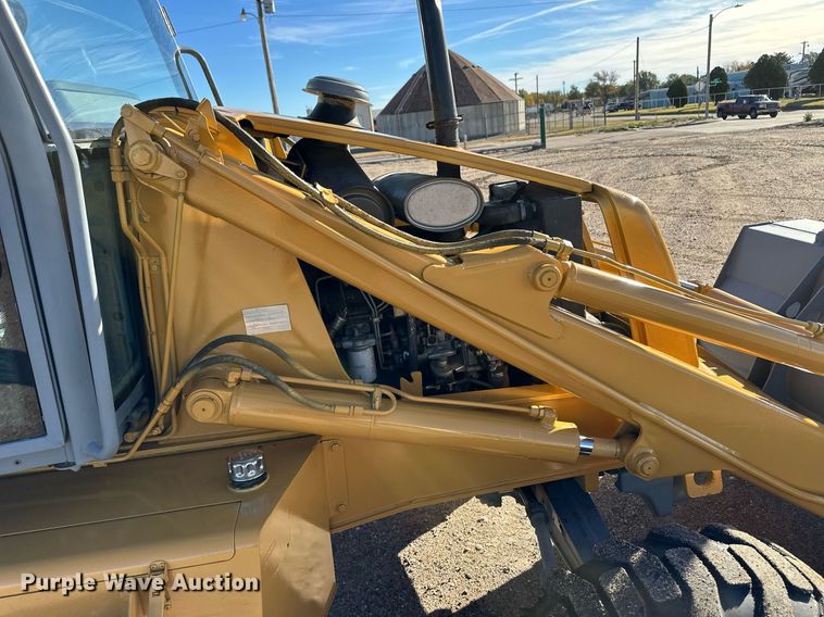 image for item DQ3160 1997 New Holland 575E backhoe