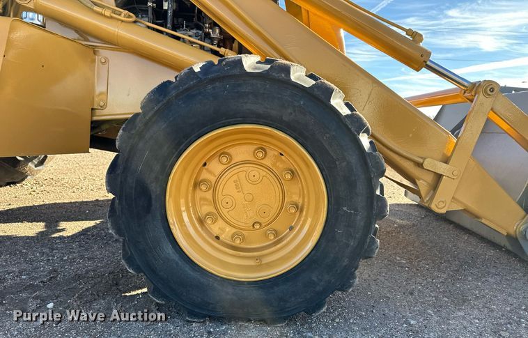 image for item DQ3160 1997 New Holland 575E backhoe