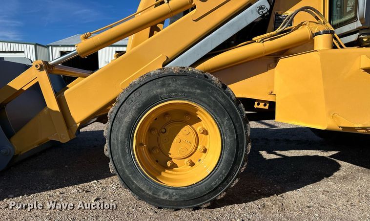 image for item DQ3160 1997 New Holland 575E backhoe