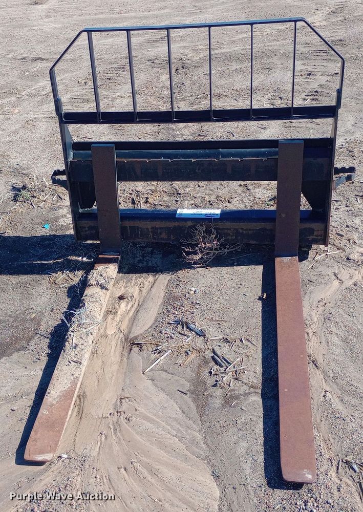 image for item DQ3163 John Deere skid steer forks