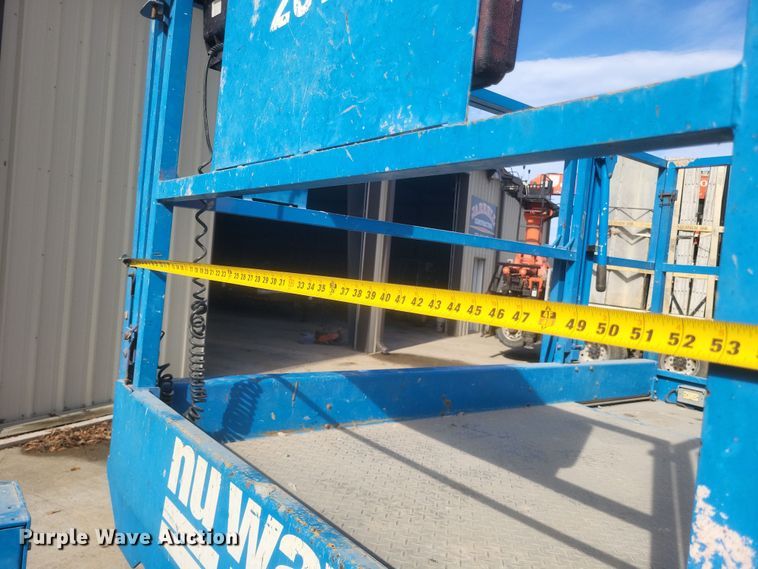 image for item DQ3784 2008 Genie GS-2668 RT scissor lift