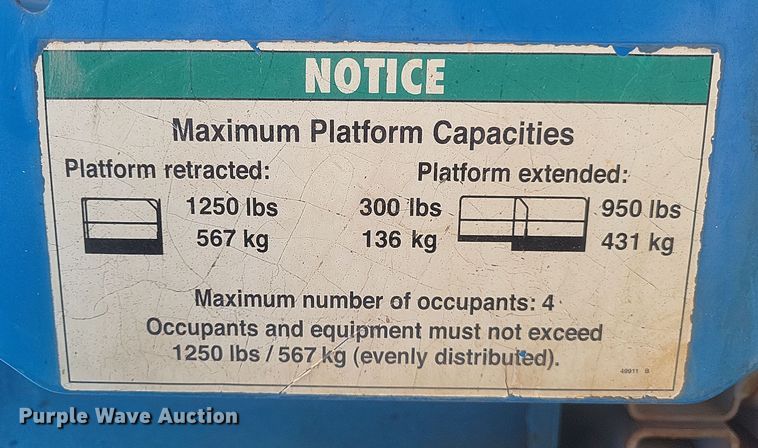 image for item DQ3784 2008 Genie GS-2668 RT scissor lift