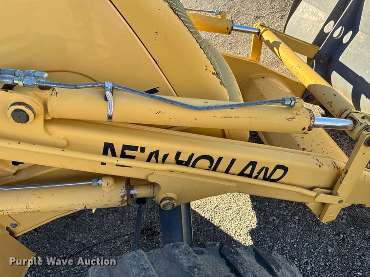 image for item EG2275 1999 New Holland 555E backhoe