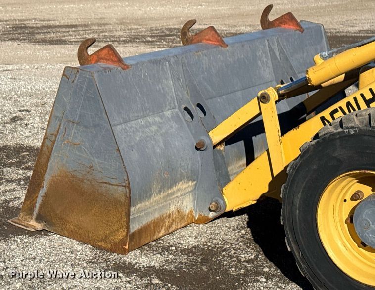 image for item EG2275 1999 New Holland 555E backhoe