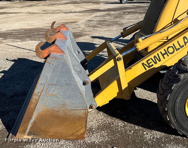 image for item EG2275 1999 New Holland 555E backhoe