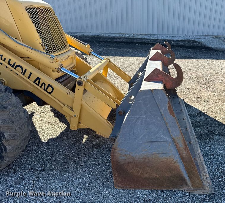 image for item EG2275 1999 New Holland 555E backhoe