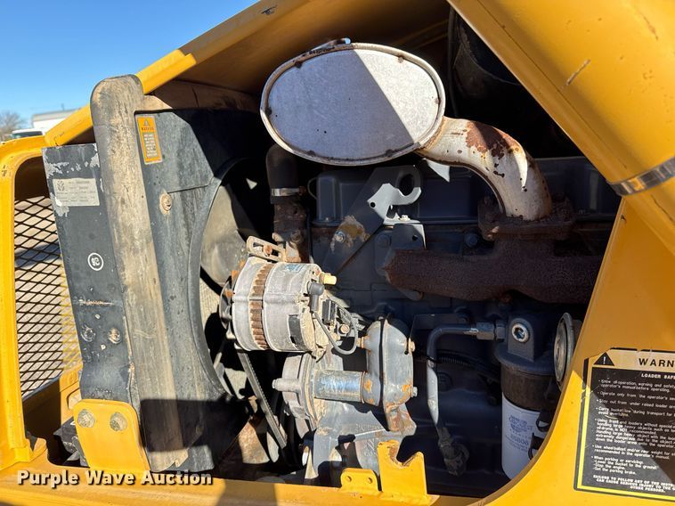 image for item EG2275 1999 New Holland 555E backhoe