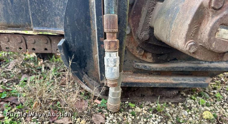 image for item EN2567 2004 Caterpillar  T9B skid steer trencher