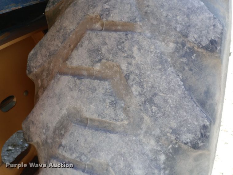 image for item EN8577 2012 John Deere 310J backhoe