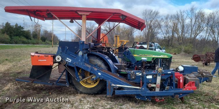 image for item DQ3807 2003 John Deere 5220 tractor with Brouwer sod harvester