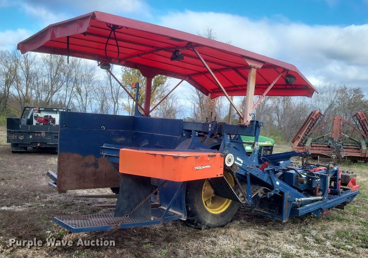 image for item DQ3807 2003 John Deere 5220 tractor with Brouwer sod harvester