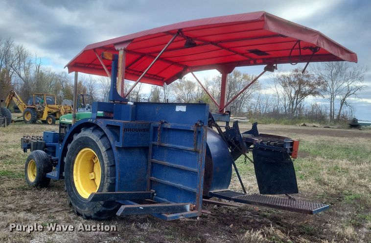 image for item DQ3807 2003 John Deere 5220 tractor with Brouwer sod harvester