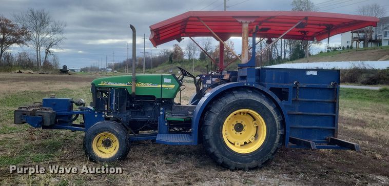 image for item DQ3807 2003 John Deere 5220 tractor with Brouwer sod harvester