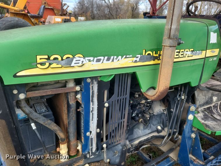 image for item DQ3807 2003 John Deere 5220 tractor with Brouwer sod harvester