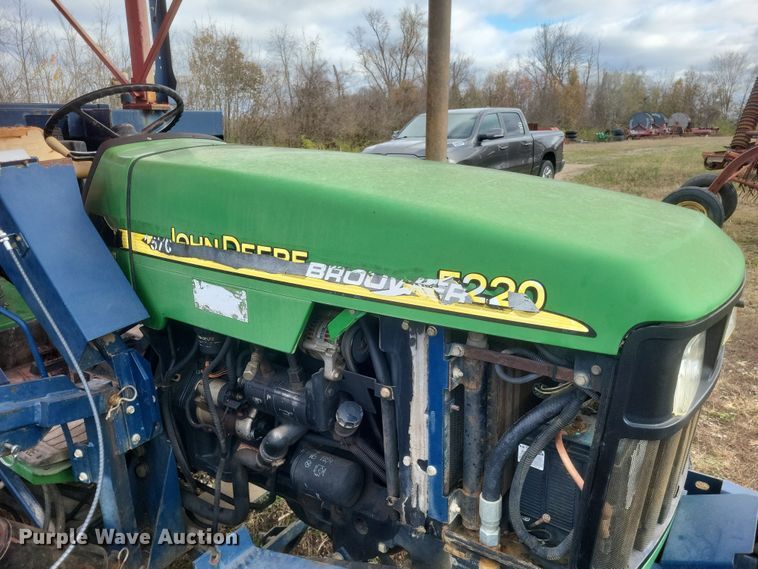 image for item DQ3807 2003 John Deere 5220 tractor with Brouwer sod harvester