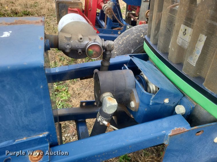 image for item DQ3807 2003 John Deere 5220 tractor with Brouwer sod harvester