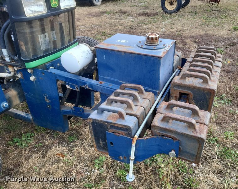 image for item DQ3807 2003 John Deere 5220 tractor with Brouwer sod harvester