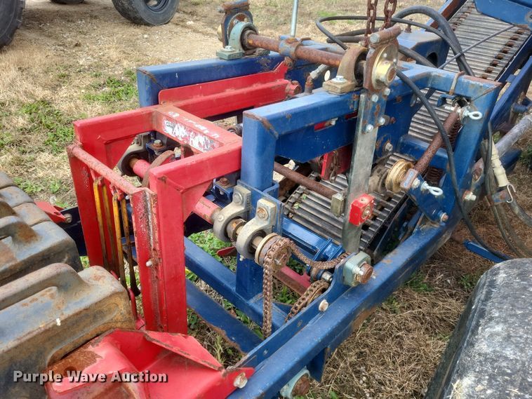 image for item DQ3807 2003 John Deere 5220 tractor with Brouwer sod harvester