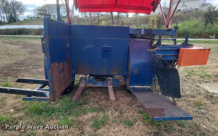 image for item DQ3807 2003 John Deere 5220 tractor with Brouwer sod harvester