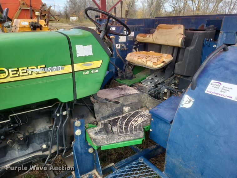 image for item DQ3807 2003 John Deere 5220 tractor with Brouwer sod harvester