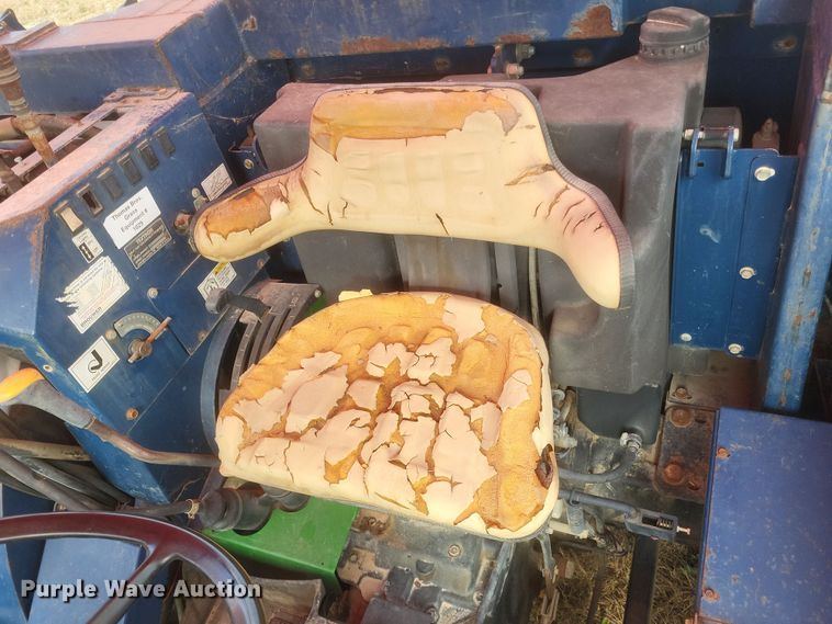 image for item DQ3807 2003 John Deere 5220 tractor with Brouwer sod harvester