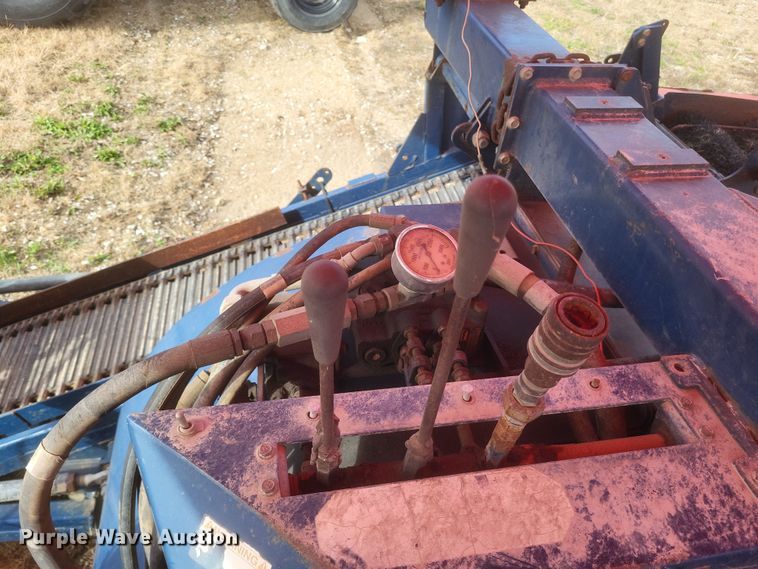 image for item DQ3807 2003 John Deere 5220 tractor with Brouwer sod harvester