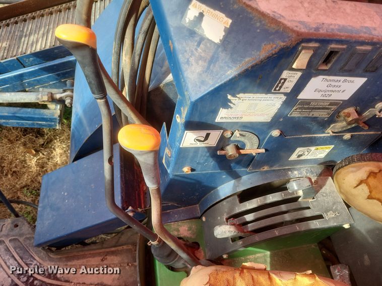 image for item DQ3807 2003 John Deere 5220 tractor with Brouwer sod harvester