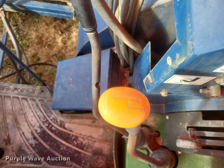 image for item DQ3807 2003 John Deere 5220 tractor with Brouwer sod harvester