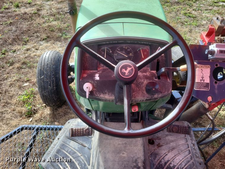 image for item DQ3807 2003 John Deere 5220 tractor with Brouwer sod harvester