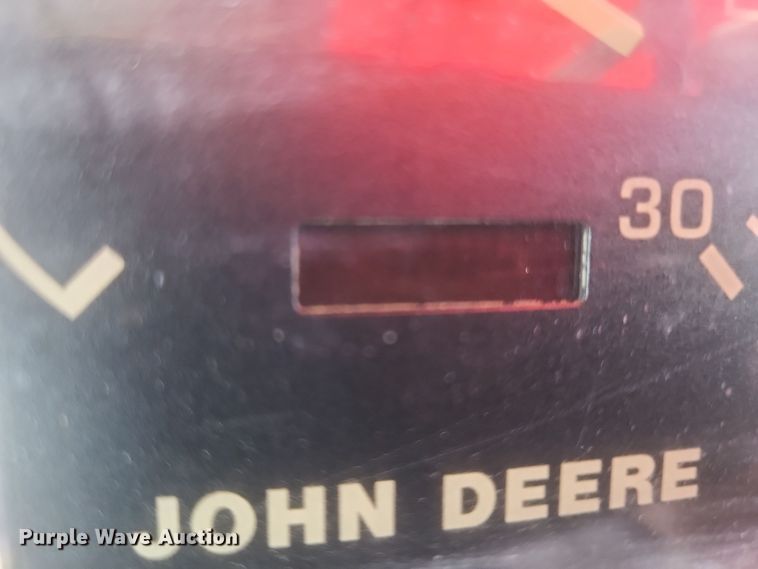 image for item DQ3807 2003 John Deere 5220 tractor with Brouwer sod harvester