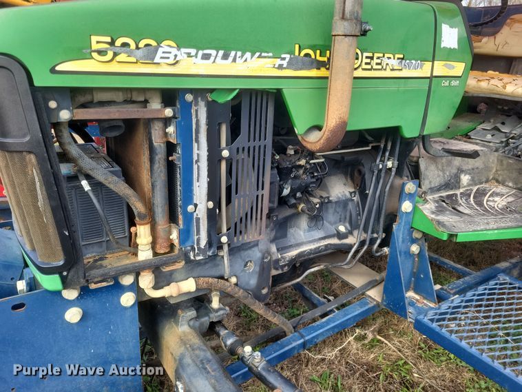 image for item DQ3807 2003 John Deere 5220 tractor with Brouwer sod harvester