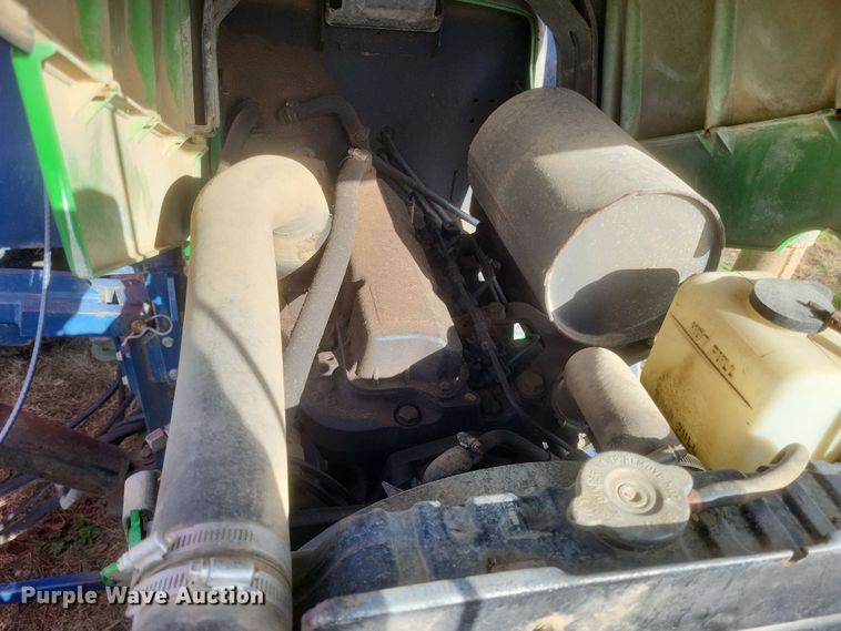 image for item DQ3807 2003 John Deere 5220 tractor with Brouwer sod harvester