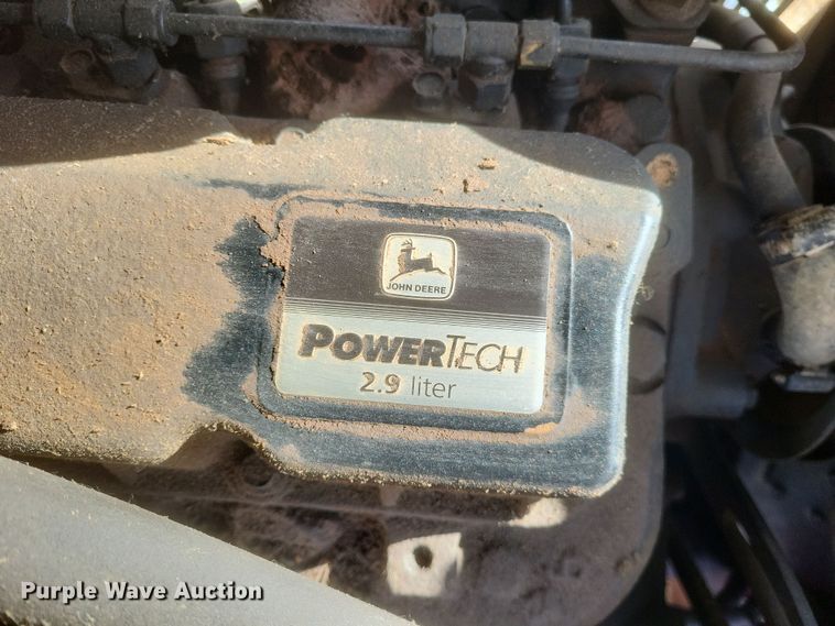 image for item DQ3807 2003 John Deere 5220 tractor with Brouwer sod harvester