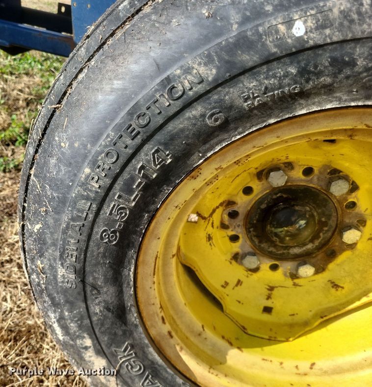 image for item DQ3807 2003 John Deere 5220 tractor with Brouwer sod harvester