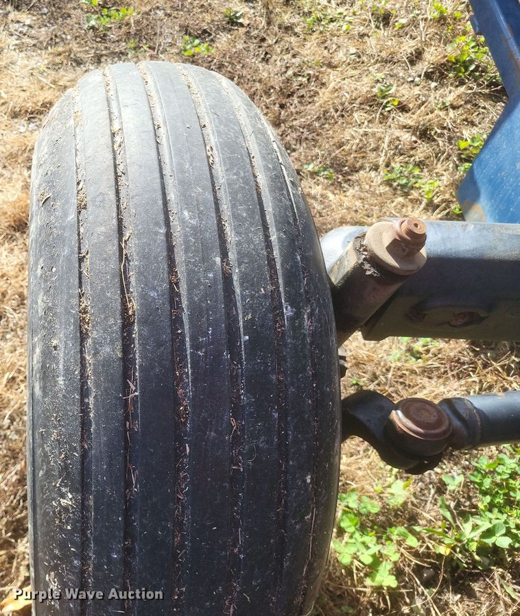 image for item DQ3807 2003 John Deere 5220 tractor with Brouwer sod harvester