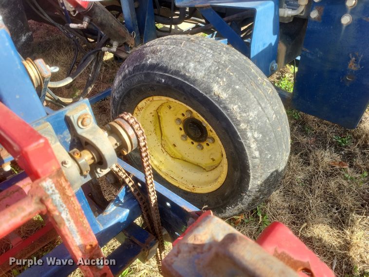 image for item DQ3807 2003 John Deere 5220 tractor with Brouwer sod harvester