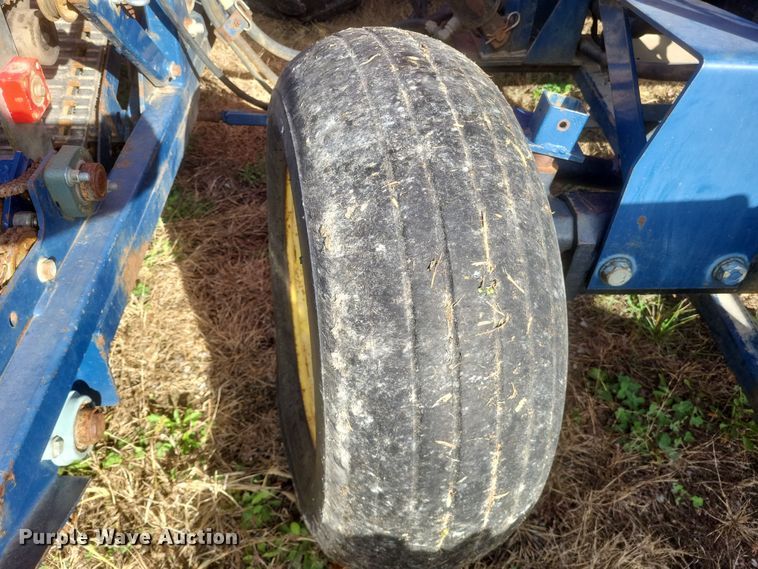 image for item DQ3807 2003 John Deere 5220 tractor with Brouwer sod harvester