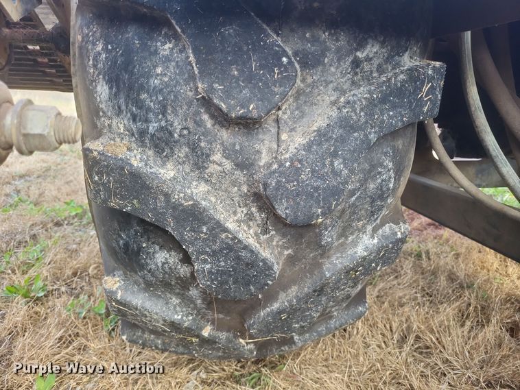 image for item DQ3807 2003 John Deere 5220 tractor with Brouwer sod harvester