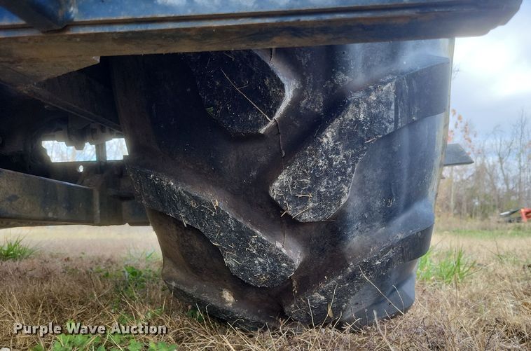 image for item DQ3807 2003 John Deere 5220 tractor with Brouwer sod harvester