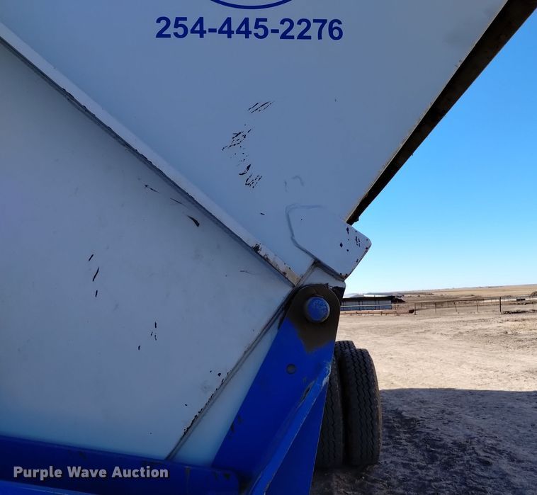 image for item DV6612 APM 28TP side dump trailer