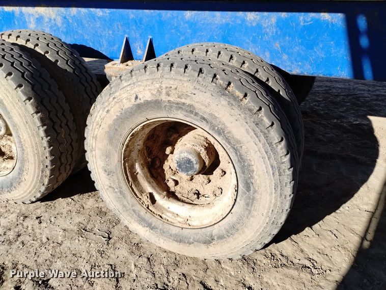 image for item DV6612 APM 28TP side dump trailer