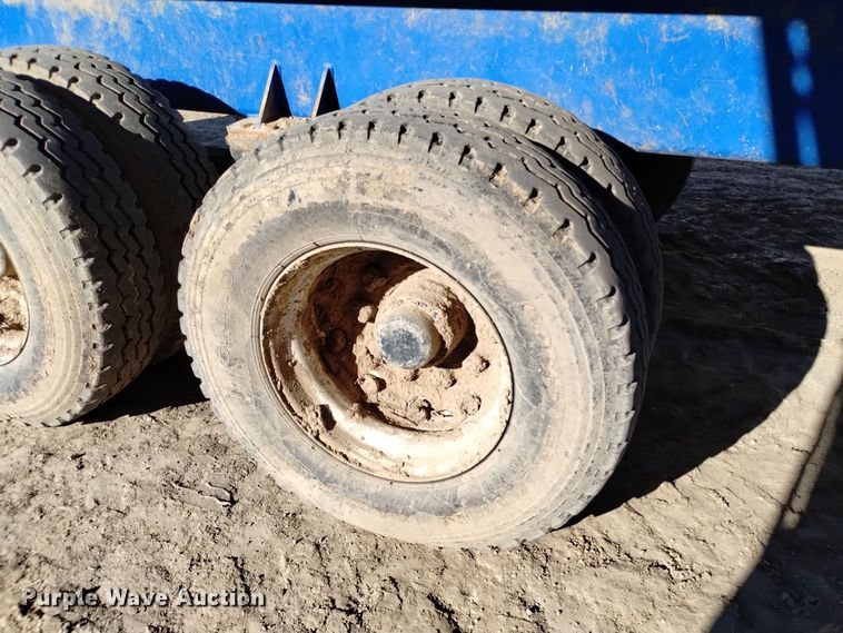 image for item DV6612 APM 28TP side dump trailer