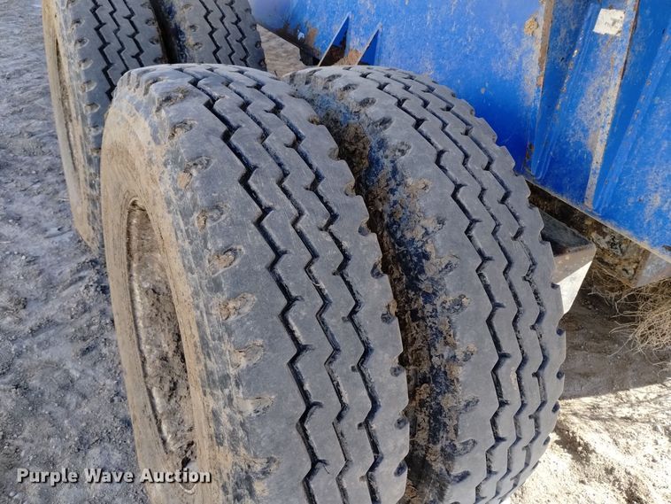 image for item DV6612 APM 28TP side dump trailer