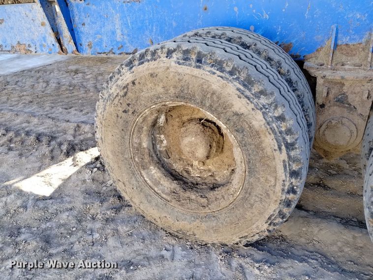 image for item DV6612 APM 28TP side dump trailer