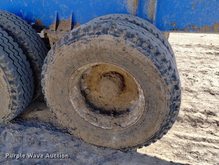 image for item DV6612 APM 28TP side dump trailer