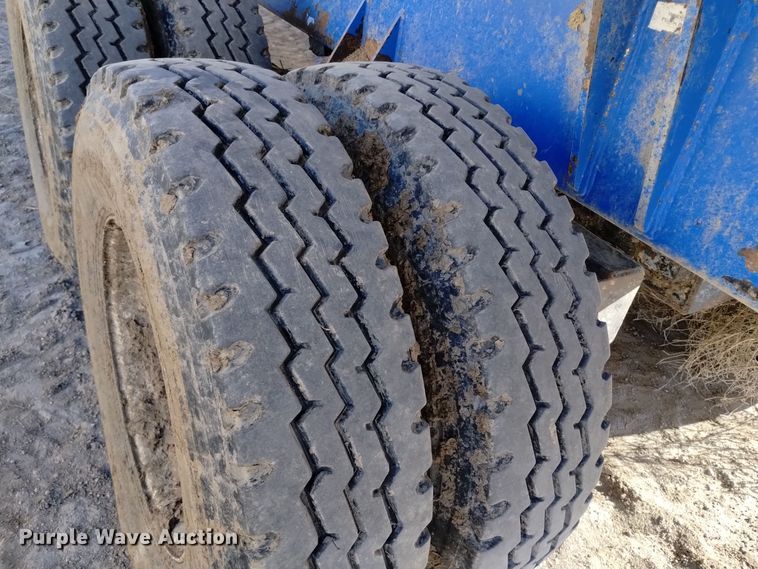 image for item DV6612 APM 28TP side dump trailer