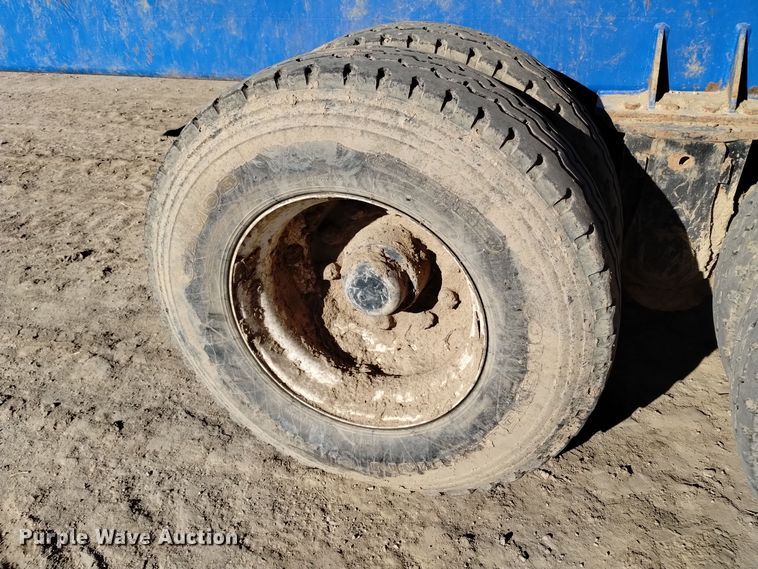 image for item DV6612 APM 28TP side dump trailer